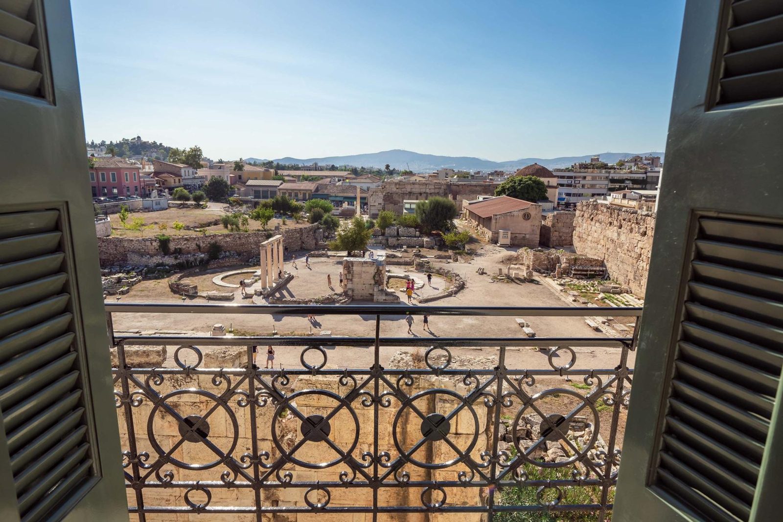 Hadrian's Library seen from a balcony with an iron railing